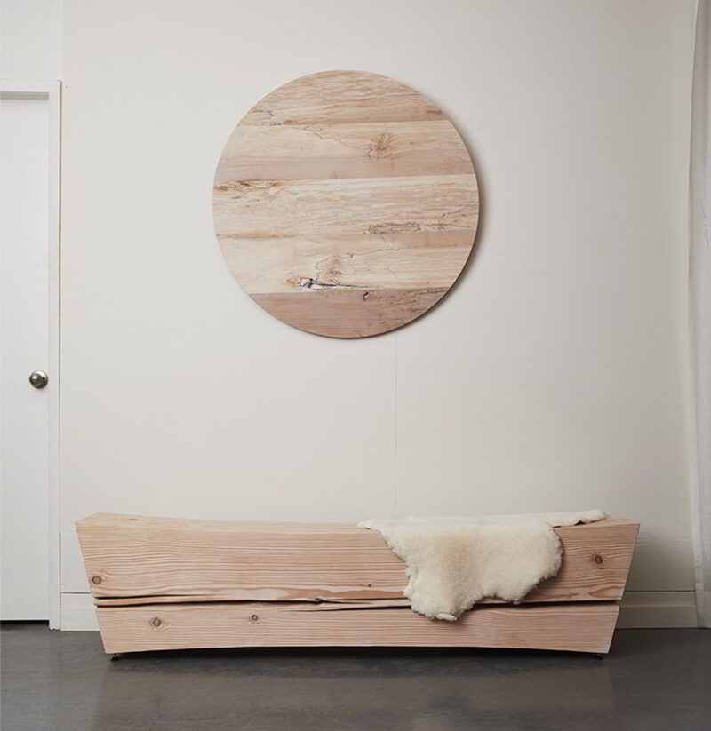 Saddle bench with wall mounted maple platter.