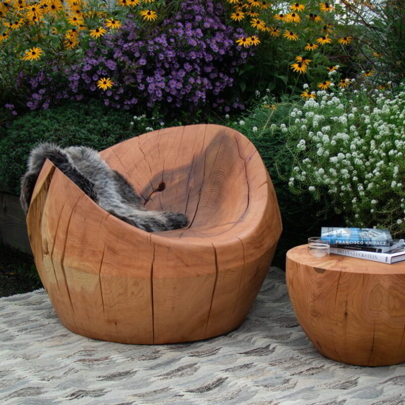 The drum table and nest chair in an outdoor setting.