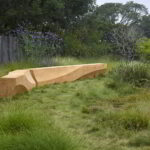 Two Tafoni benches are sat against the Bernard Trainor & Associates Landscape.