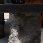 Detail photo of the Island Bench's Basalt legs.