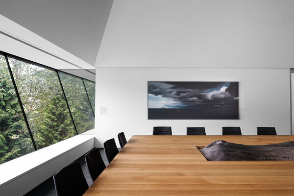 The conference room table at the Audain Art Museum in Whistler is pictured. The conference room windows look out to the town.