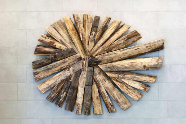 Radial wall piece made from weathered split balsam